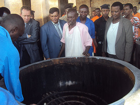 Mary Gahonzire (extreme left) and other officials inspecting biogas cooking facility at Nsinda prison (File photo)