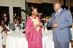 The Minister of Foreign Affairs, Louise Mushikiwabo with Ugandau2019s High Commissioner, Richard Kabonero during celebrations mark to Ugandau2019s Independence. (Photo; J. Mbanda)