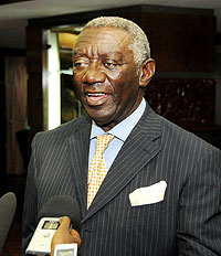Former Ghanaian President John Kuffour speaking to the press upon his arrival yesterday (Photo T Kisambira)