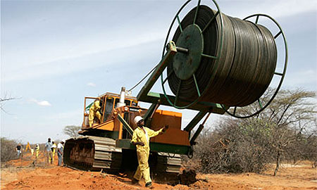 Engineers lay fibre-optic cables at Seredupi, north of Nairobi. Hopes are high that better connectivity will be a development boost. Photograph: Antony Njuguna/Reuters