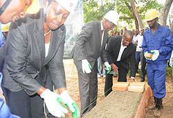 The Minister of Local Government, James Musoni (R) and Dr Aisa Kirabo during the laying of the foundation (Photo; S. Mugisha)