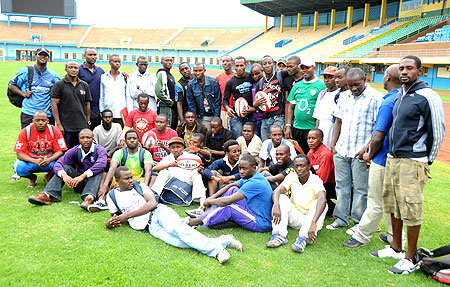 The participants pose for a photo with trainers, John Bosco Muamba (Standing 2nd Left) and Erick Situma (extreme right). (Photo T.Kisambira)