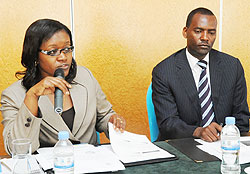 Minister Monique Mukaruliza and Robert Ssali during the workshop yesterday (Photo T. Kisambira)