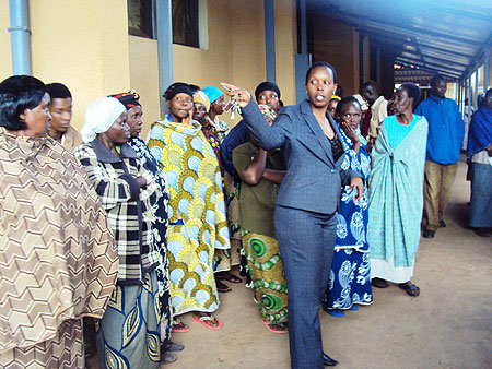 Jeanine Dusabe, Rwamagana Hospital administrator directing bereaved parents. Photo S. Rwembeho