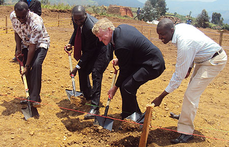 Bay View Group president Dr Roderick Marshal and KHIu2019s Eugene Seminega (L) join local leaders in the ground-breaking ceremony of the construction of the new facility. Photo S Nkurunziza