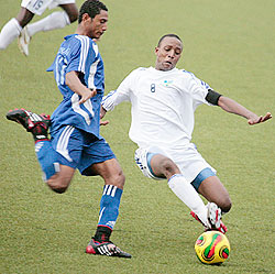 Junior Wasps captain tries to beat a Zanzibar player in the Cecafa Youth Championship which was hosted by Eritrea. 