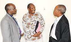 L-R; Fr. Laurent Rutinduka, Jean Pierre Dusingizemungu and Prof. Laurent Nkusi during the launch of the book (Photo; T. Kisambira)