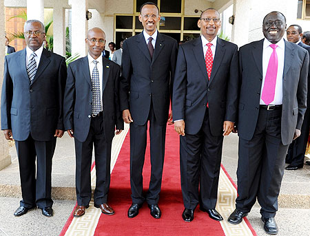 President Paul Kagame with the four ministers after the swearing-in yesterday (L-R) Marcel Gatsinzi, Ignace Gatare, John Rwangombwa and Tharcisse Karugarama. (Photo: Urugwiro Village)