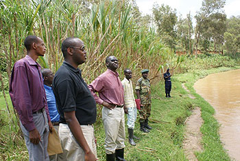 Minister of Environment, Stanislas Kamanzi at the river banks (Photo F. Ntawukuriryayo)