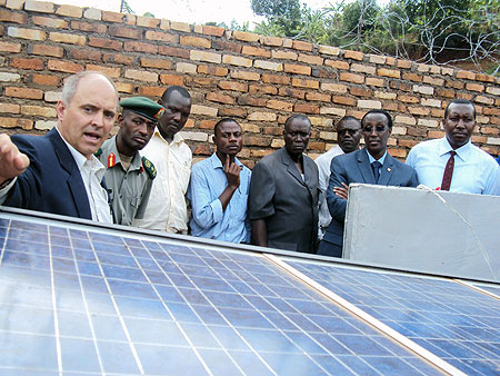 The project engineer explains to officials how the purfication system of the water project  operates. (Photo: J.P Bucyensenge)