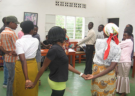 A group of Maraba farmers with SPREAD theatre facilitators acting during the launch of the campaign (Photo; JP.Bucyensenge)
