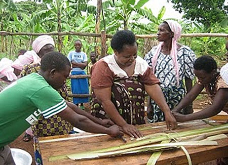 Rwandan women group try it out with banana fibres as a raw material for sanitary pads.
