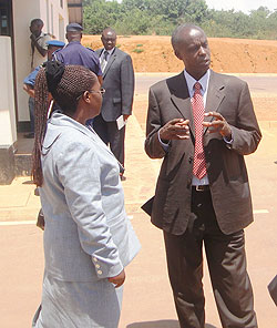 Governor, Dr. Ephraim Kabaija (C) chatting with Muyinga Governor Petronie Sindabahaga (Photo; S. Rwembeho)