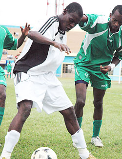 Abbas Rassou shields off a Kiyovu player in a past league match. The striker is ruled out of todayu2019s clash against AS Kigali. (File Photo)