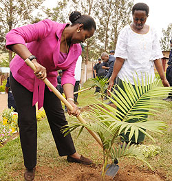 First Lady and City mayor, Aisa Kacyira during tree planting communal work at Kacyiru police hospital yesterday. (Courtesy photo)