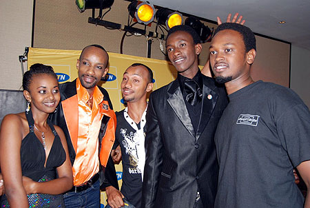 The winners pose with fashion designer, Daddy de Maximo, who dressed the contestants (second from left).