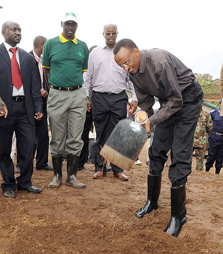 President Kagame preparing to plant a tree in Nyaruguru yesterday (Photo Urugwiro Village)