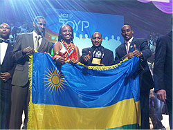 Joseph Nkurunziza (centre) pauses alongside Fabrice Shema of JCI Rwanda (right) and Counselor Benedicto Nshimyimana. (Courtesy photo)