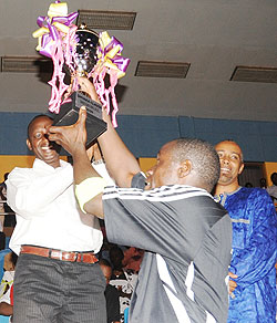 APR captain Mbuyu Twite and club president Alex Kagame lift the trophy. (Photo. J. Mbanda)