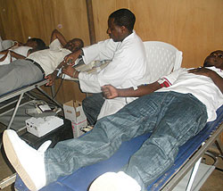 A Blood Bank official attends to blood donors, yesterday (Photo; G. Iribagiza)