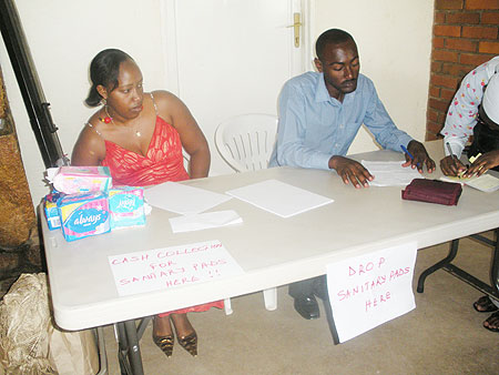  Sifa Uwera (L) and collegue collecting Sanitary Pads meant to benefit women suffering from obsteric fistula.