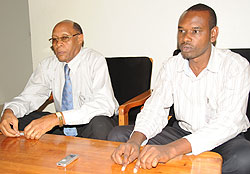 Martin Muhoza (R) and Ildephonse Karengera of CNLG talking to The New Times yesterday (Photo; J Mbanda)