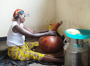 Esperance Mukagatare makes butter traditionally. Photo S Rwembeho