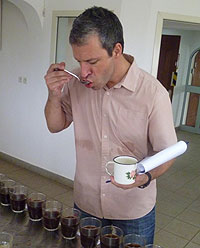 One of researchers tastes the various coffees (courtesy photo)