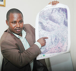 The Director General of Land Centre Dr Emmanuel Nkuruziza demonstrating how land mapping is done in a past event (File Photo)