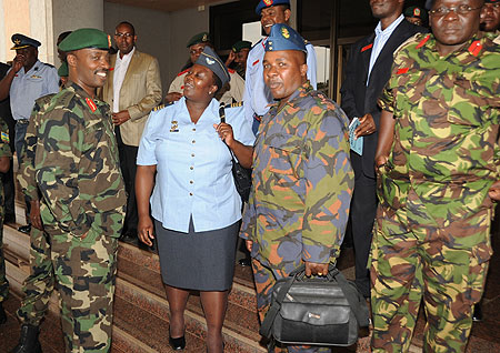 The Chief of Defence Staff Lt. Gen. Charles Kayonga (L) talking to a delegation from the Kenya National Defence College (Photo J Mbanda)