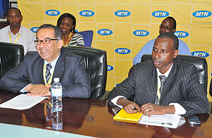 MTNu2019s Chief Executive Officer, Khaled Mikkawi  and the companyu2019s Marketing Operations Manager, Robert Rwakabogo during a press conference at the companyu2019s head office yesterday(Photo by T Kisambira)