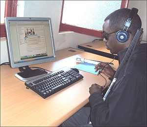 A visually impaired student uses a computer at the start of the training (Photo P Ntambara)