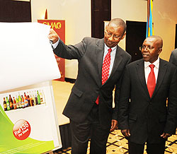 Minister of Finance John Rwangombwa unveils the Bralirwa IPO last month. He has described the IPO as a success (File Photo)