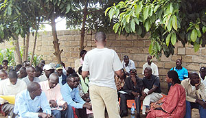 A section of farmers listening to RIU's Clement Kirenga after touring RDO maize stores in Nyagatare sector. (Photo.D.Ngabonziza.J)