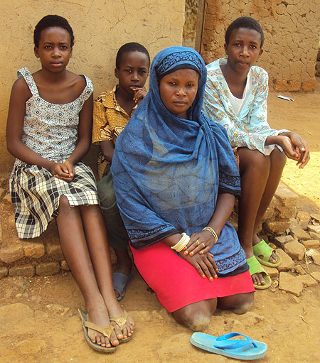 Usher Irakoze (R) and her family. (photo by S.Nkurunziza)