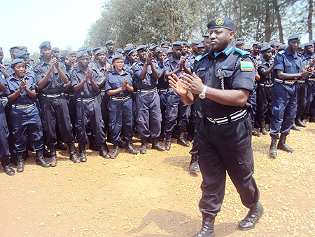 CGP, Emmanuel Gasana, enjoys a good moment with police officers in Gishari. Photo by S. Rwembeho.
