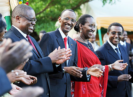 President Kagame and First Lady, Jeannette Kagame, listen to remarks by one of the guests, yesterday (Photo Village Urugwiro)