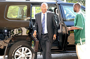 Minister John Rwangombwa heads to the Parliament to present the FY 2010-11 Budget (File photo)