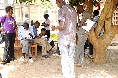 Students who were not considered for bursaries fill appeal forms at Student Financing Agency for Rwanda offices  (Photo T.Kisambira)