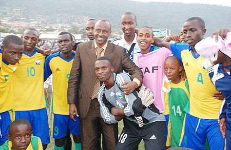 Ferwafa boss John Bosco Kazura (c) joins in on the celebrations after today's 1-0 win over Egypt which not only qualifies Rwanda to the semi-finals of the Caf U-17 championship but also seals a slot to the U-17 Fifa World Cup which will be held in Mexico.