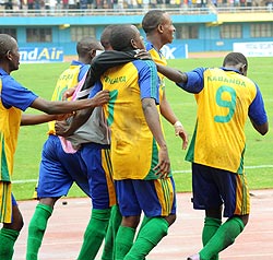 Junior Wasps players celebrate Faustin Usengimana's 8th minute goal yesterday. (Photo E. Niyonshuti)