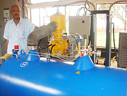 RARDA boss Dr Theogene Rutagwenda inspects the Nitrogen Gas Machine (Courtsey Photo)
