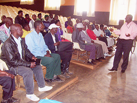 Rukerikibaye addressing representatives of people living with disabilities on Wednesday at the district hall. (Photo by A.Gahene)