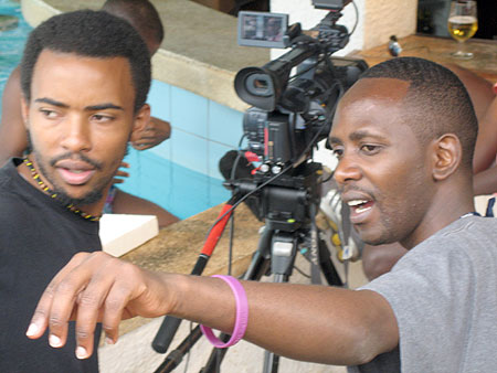 Cameras on! Rwandan film star, Gilbert Ndahayo (R) shoots his latest film (courtesy photo).