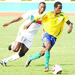 Haruna Niyonzima (R) in action against Benin. (File Photo)