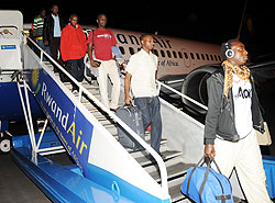 Rwandans studying in Egypt arriving at Kigali International Airport aboard a Rwandair Plane last evening. (Photo J Mbanda)