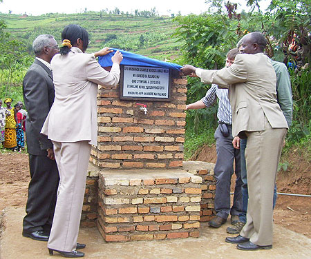 Mayor Kangwagye and Ministers Ruhamya and Gen.Gatsinzi during the  launch of a  water project at Kajevuba cell. File  Photo
