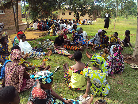 Women listen to electoral guidelines from NEC officials.(Photo S. Rwembeho)