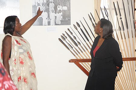 Minister Nsanzabaganwa being taken on guided  tour of the Huye museum by an official of the insitution (Photo J P Bucyensenge)