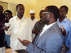 Governor Munyentwari in a laboratory at Kubumwe enterprises. Photo J P. Bucyensenge